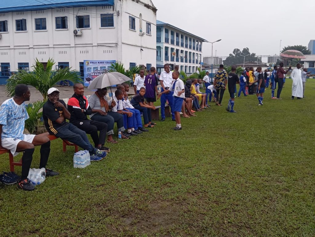 Spectators at the match between the Old Boys Soccer team and the school team